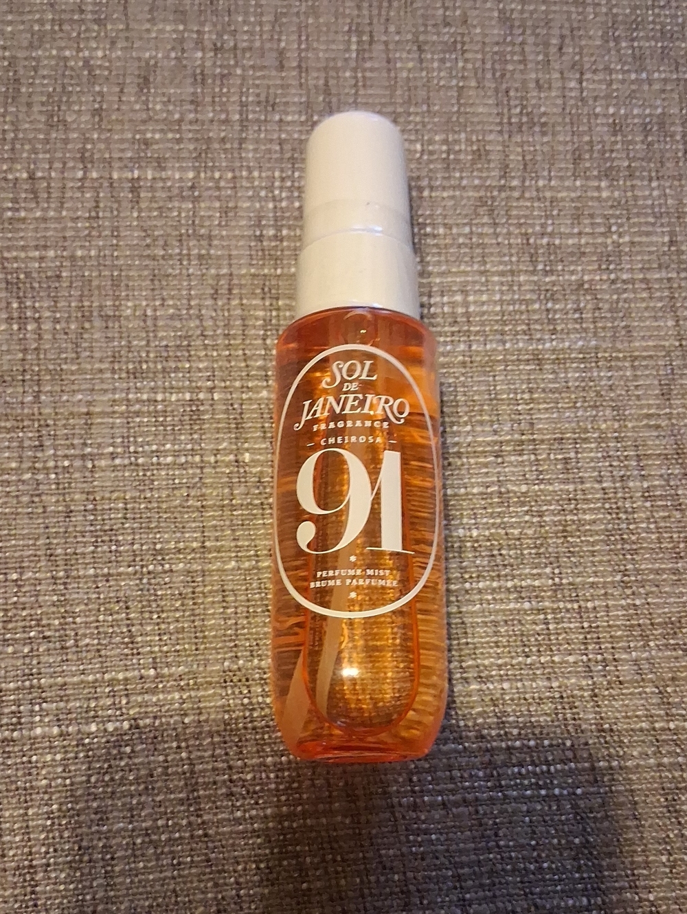 Sol de Janeiro 91 Body Mist Bottle in Orange and White
